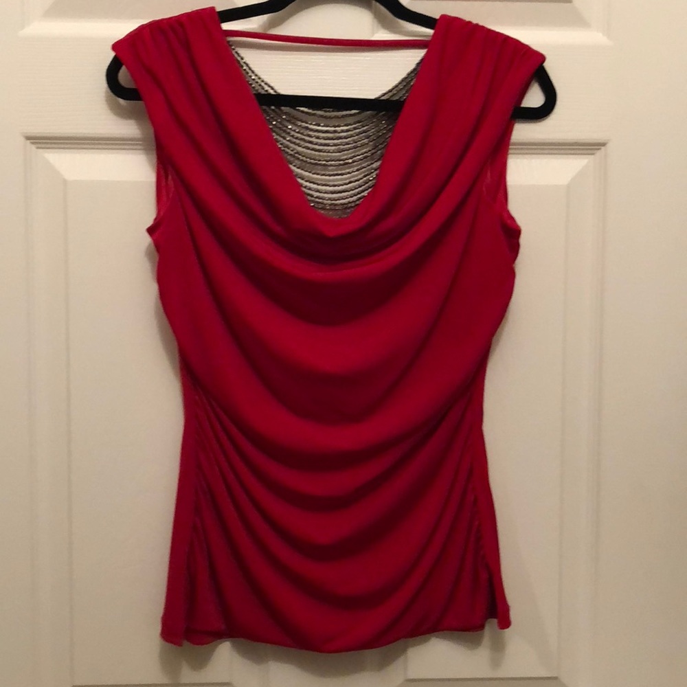 Beaded sleeveless cowl neck top.